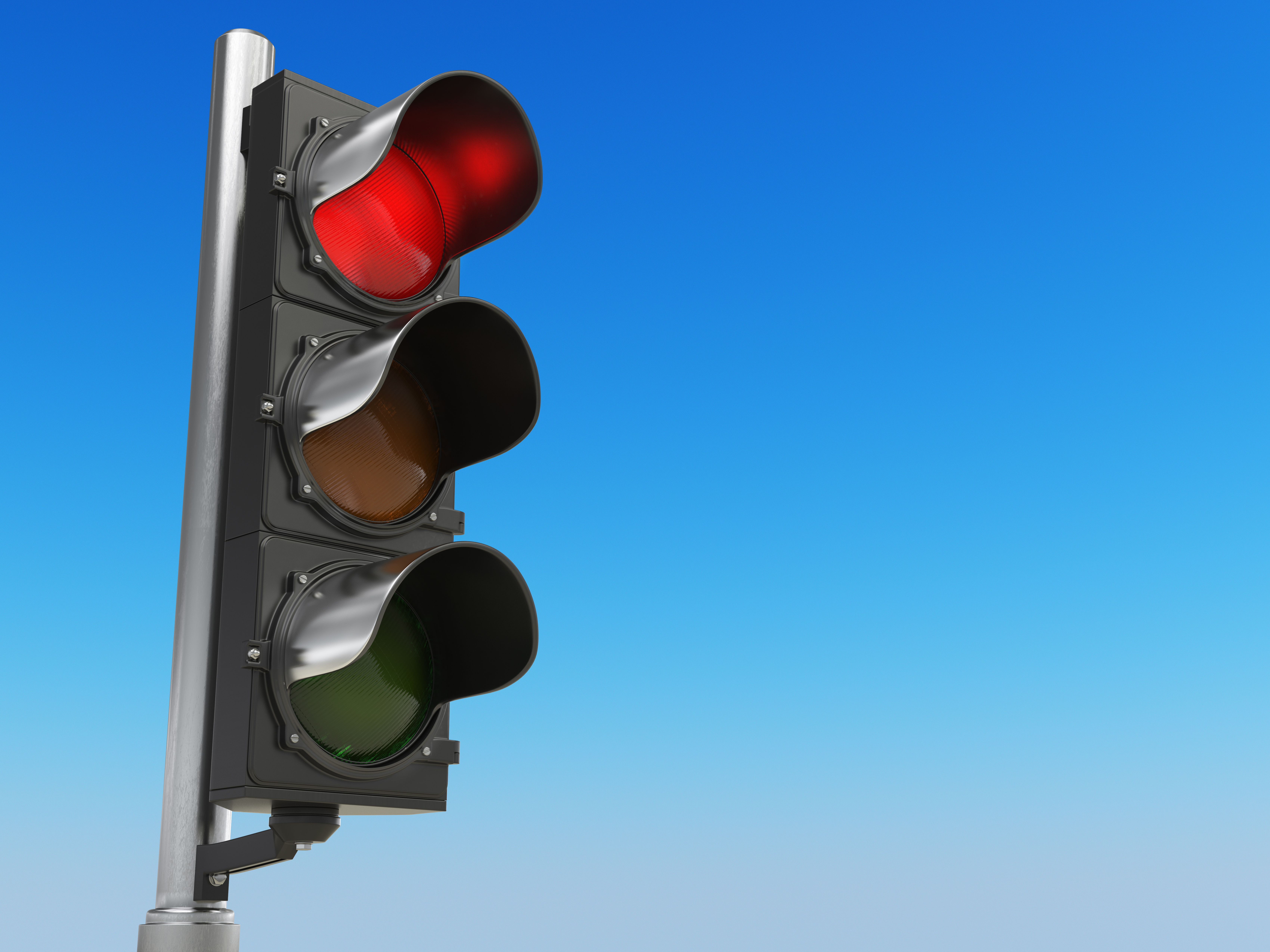 traffic-light-with-red-color-on-blue-sky-PZMSUQ7